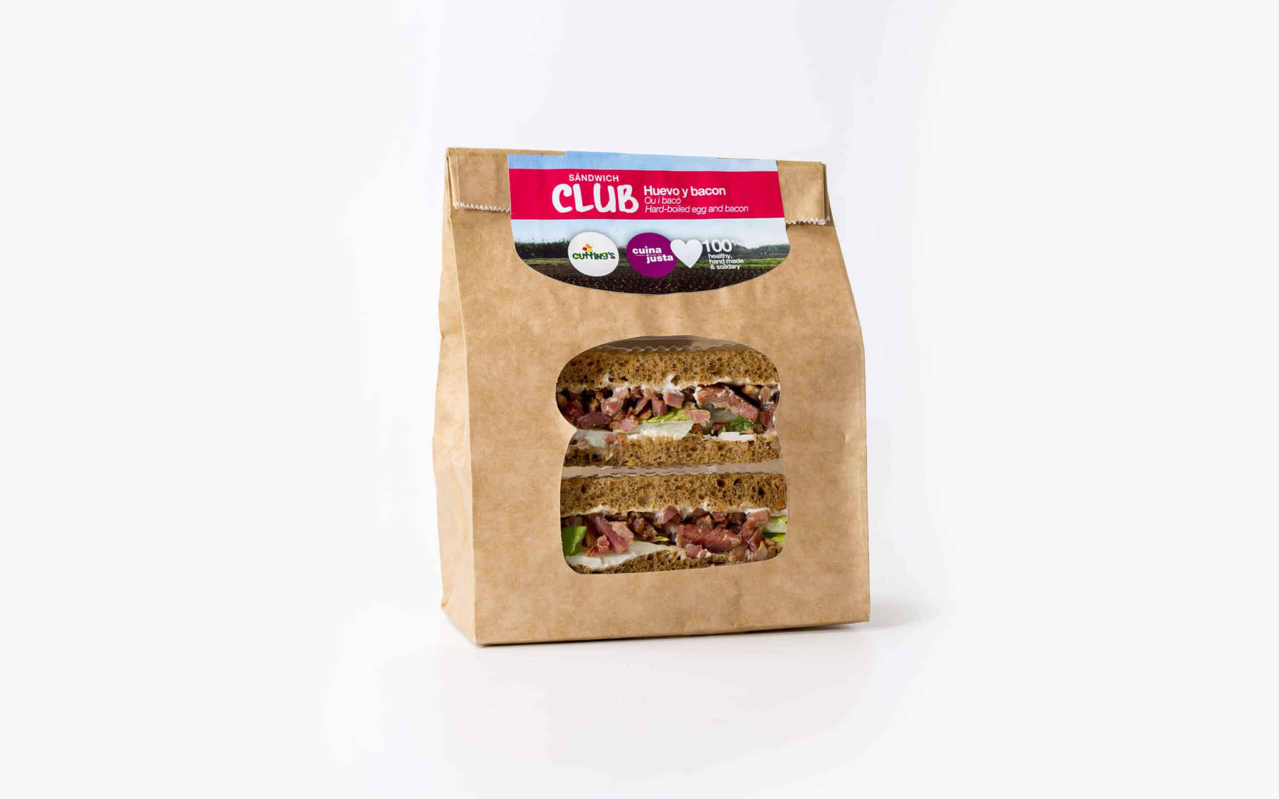 Aplicación de marca de Cuina Justa en catering, diseño Mariona Agency