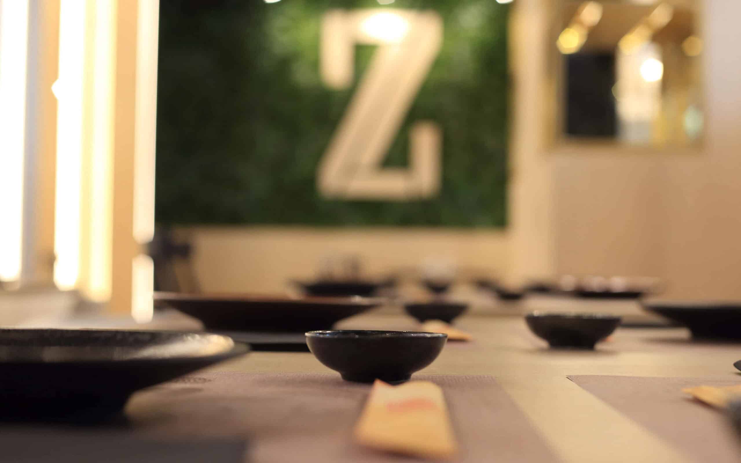 Logotipo de Zuka aplicado en soportes, diseño de Mariona Agency